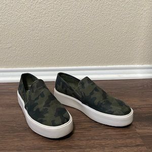 Green camo slip on sneakers